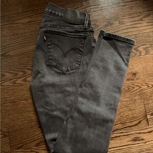 710 Super Skinny Black Jeans 29